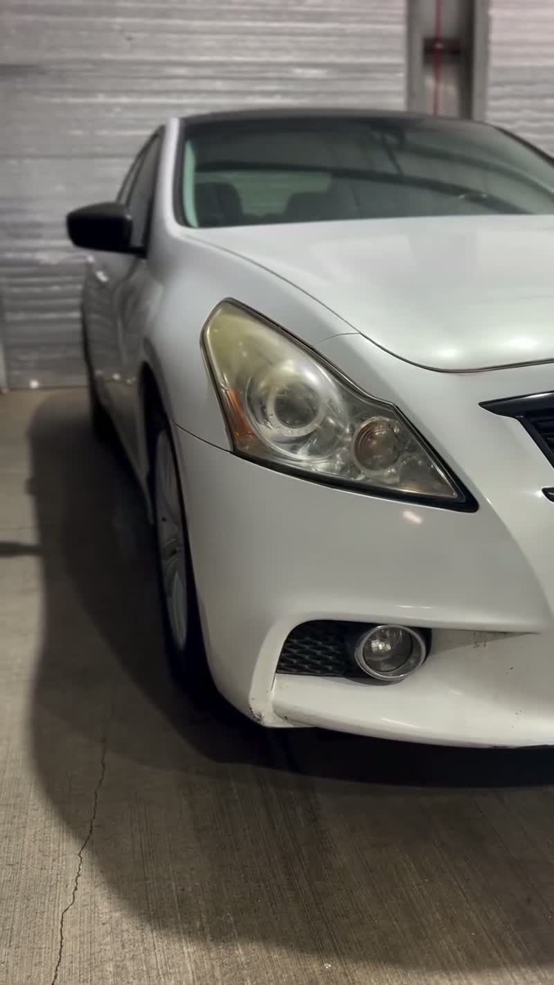 Exterior detailing - white Nissan Altima with polished paint and clear headlights, Premier Auto Detailing Salina KS