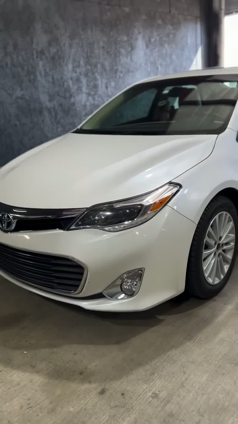 White Toyota Avalon being detailed at the Premier Auto Detailing shop in Salina KS